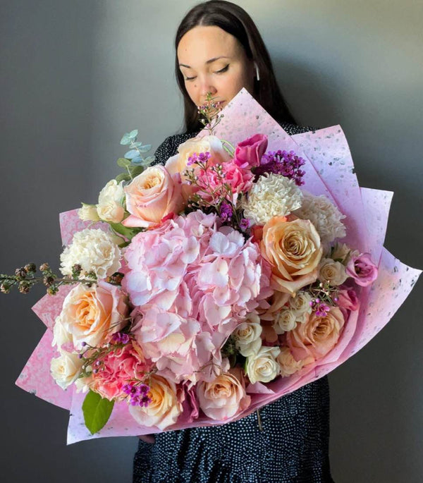 European hand-tied bouquet by Blooms of Paradise florist in Cambridge